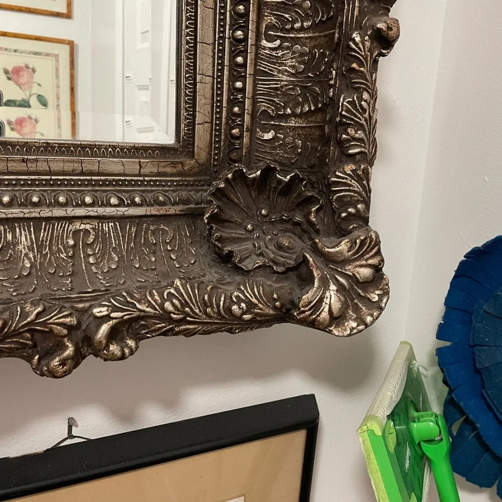Beautiful carved mirror with little pearls in the oyster shells and much carving